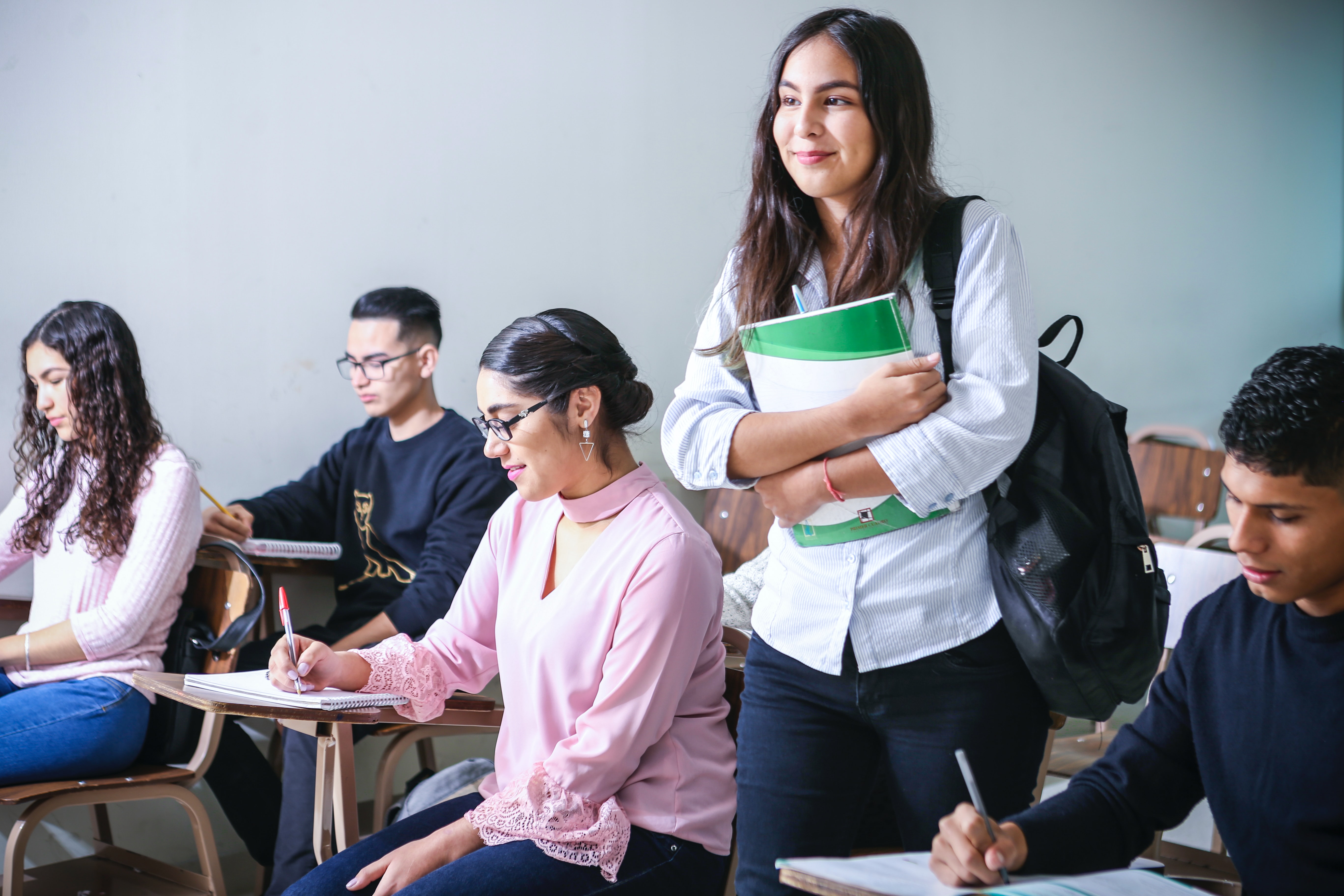 student standing up in class